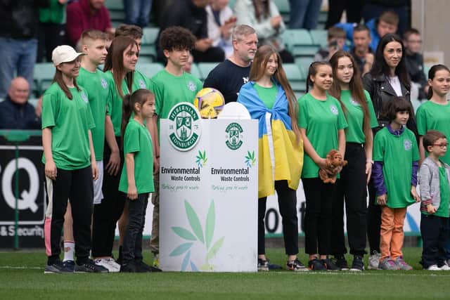 Dnipro Kids deliver the match ball ahead of the game between Hibernian and St Johnstone on Sunday (Picture: Paul Devlin/SNS Group)