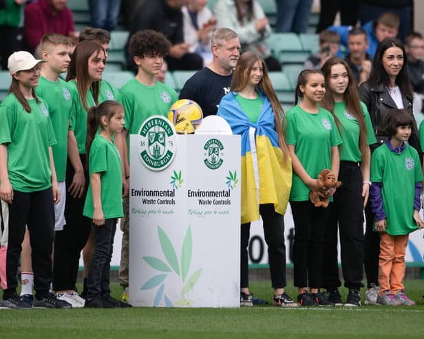 Dnipro Kids deliver the match ball ahead of the game between Hibernian and St Johnstone on Sunday (Picture: Paul Devlin/SNS Group)