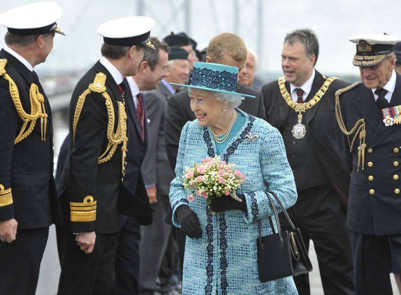 Her Majesty The Queen and Prince Philip visiting the viewing area of the Forth Road Bridge in 2014 to unveil a new plaque marking the 50th anniversary of her opening the bridge.
