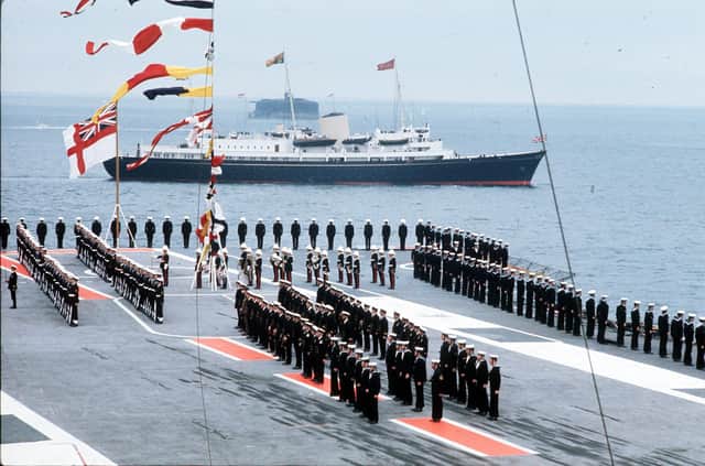 The Royal Yacht Britannia takes part in a Review of the Fleet at Spithead in 1988