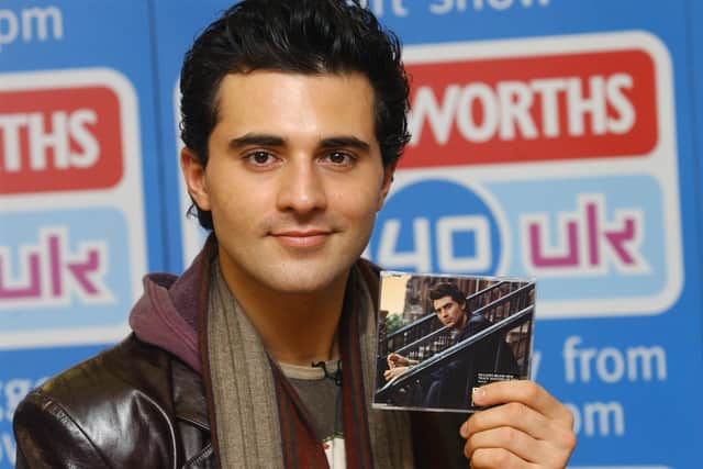 Darius Campbell Danesh at Woolworths, in Watford, in 2005. The Scottish singer's death has been ruled an accident (Credit: PA)