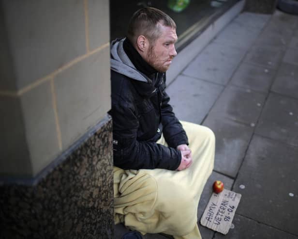 A homeless army veteran begs on the street. Picture: Christopher Furlong/Getty Images