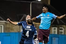 Armand Gnanduillet rises to head home Hearts' fourth and his second in the 4-0 win over Raith. (Photo by Ross Parker / SNS Group)