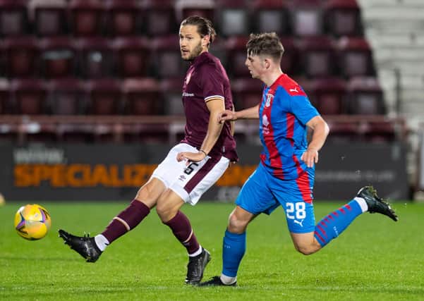 Hearts boss Robbie Neilson has been delighted with midfielder Peter Haring. Picture: SNS