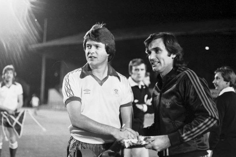 Hibs football team captain Ally MacLeod welcomes former player George Best to Easter Road before the Hibs v San Jose Earthquakes friendly in October 1981.