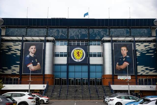 The saltire stands at half mast at Hampden Park as the SPFL announced domestic fixtures would resume this weekend following the death of Queen Elizabeth II. Picture: SNS