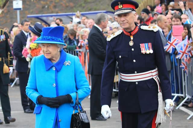 The Queen and the then Lord Lieutenant of Midlothian, Sir Robert Clark, at the Borders Railway opening in 2015.