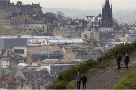A walker on the Radical Road in Holyrood Park travels the route named in recognition of the labourers used to create it. Picture: Ian Rutherford