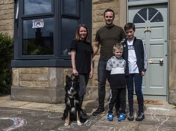 Siobhan Ballantyne and Steven Rae with their children Evan (11) and Harris (6) and Border Collie Dog Finn. Siobhan is a Royal Blind Residential Care Worker Nurse and Steven is working from home as a pensions business analyst for one of Edinburgh's large insurance companies.