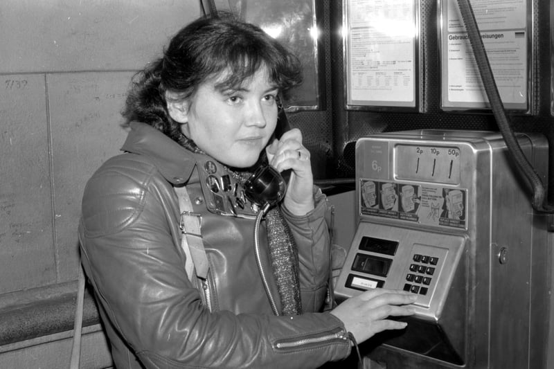 Teenager using new push-button telephones at Waverley Station, Edinburgh in February 1980.