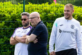 Ben Kensell, right, with Hibs manager Lee Johnson and director of football Brian McDermott. Picture: Mark Scates/SNS Group
