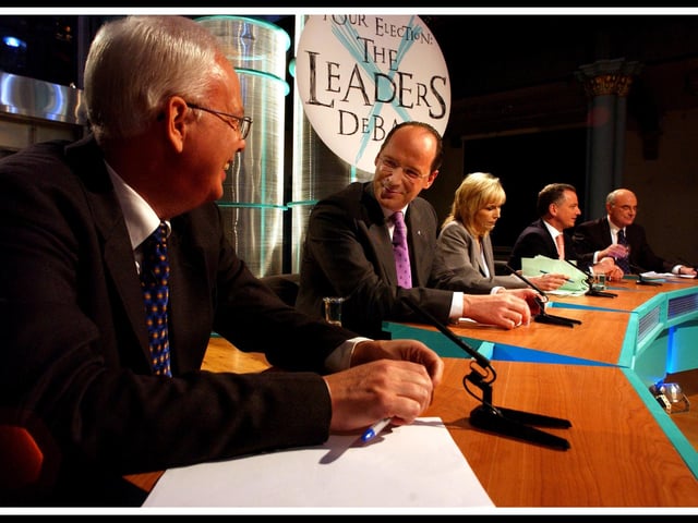 The party chiefs assemble for a BBC programme The Leaders Debate hosted by Anne MacKenzie. Lib Dem leader Jim Wallace and SNP counterpart John Swinney chat before the event gets under way. Also taking part were Labour's Jack McConnell and David McLetchie of the Conservatives.