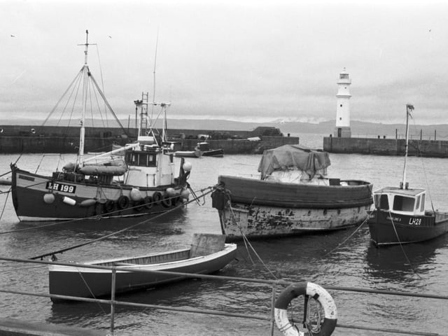 Fishing boats moored at Newhaven harbour, December 1988.