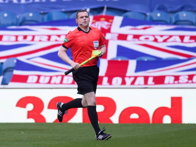 Assistant referee and Leader of the Scottish Conservative party Douglas Ross warms up prior to the Ladbrokes Scottish Premiership match between Rangers FC and St. Mirren at Ibrox Stadium on August 9, 2020 in Glasgow
