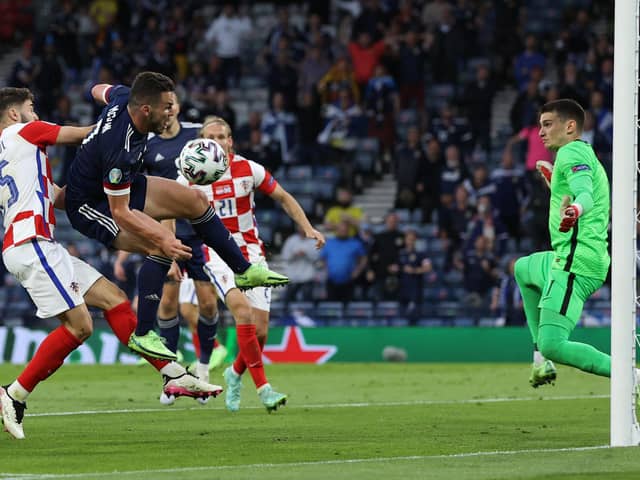 John McGinn goes close to scoring during Scotland's 3-1 defeat to Croatia in the Euro 2020 Group D fixture at Hampden. (Photo by LEE SMITH/POOL/AFP via Getty Images)