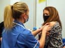People are to be offered a flu vaccine with their Covid booster shot (Picture: Steve Parsons/WPA Pool/Getty Images)