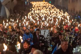 Edinburgh's traditional torchlight procession was dropped from this year's Hogmanay programme due to a lack of funding and the economic climate. Picture: Ian Georgeson
