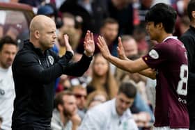Hearts goal scorer Yutaro Oda is congratulated by interim manager Steven Naismith for his performance