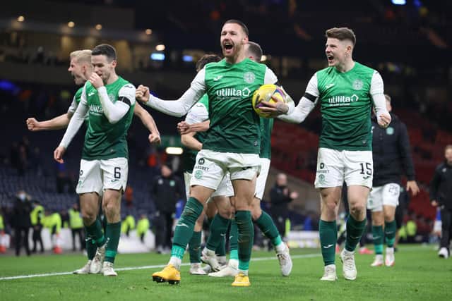 Kevin Nisbet celebrates at full time with Martin Boyle after Hibs' Premier Sports Cup semi-final victory over Rangers at Hampden Park.
