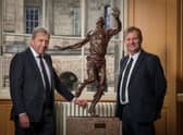 Professor Peter Mathieson, Principal and Vice-Chancellor of the University of Edinburgh, with John MacMillan, CEO, The Eric Liddell Community, with the statue of Eric Liddell at Edinburgh University.