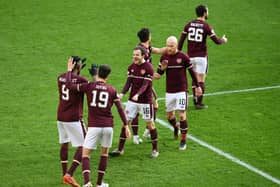 Hearts changed shape against Dundee and won 2-1. Picture: SNS