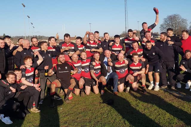 The Lasswade squad celebrated after clinching the Tennent’s National League Division Three title on Saturday when they defeated second placed Howe of Fife 13-10