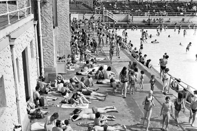 Families enjoying the summer sunshine at Portobello open-air swimming pool in July 1971. Picture: Ian Brand.