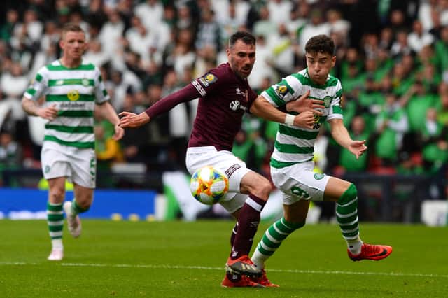 Hearts' Michael Smith takes on Celtic's Mikey Johnston in the 2019 Scottish Cup final.