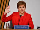 First Minister Nicola Sturgeon takes the oath before giving evidence to the Holyrood committee on the Alex Salmond saga. Picture: Jeff J Mitchell/PA.
