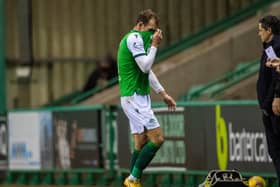 Hibs striker Christian Doidge walks off after being shown the red card against St Mirren on Wednesday, meaning he will miss the trip to Rangers on Boxing Day. (Photo by Bill Murray / SNS Group)