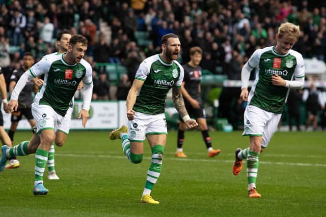 Martin Boyle celebrates after putting Hibs 1-0 up from the penalty spot. Picture: SNS