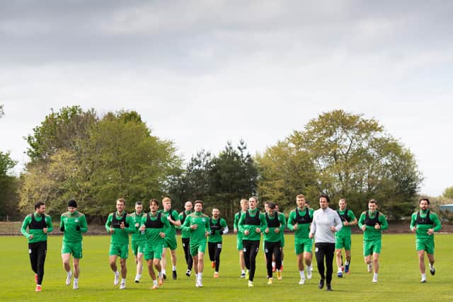 In it together, the Hibs squad warm up for Saturday's season finale. Photo by Paul Devlin / SNS Group