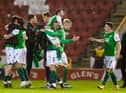 Hibs players celebrate their win over Aberdeen and finishing third.