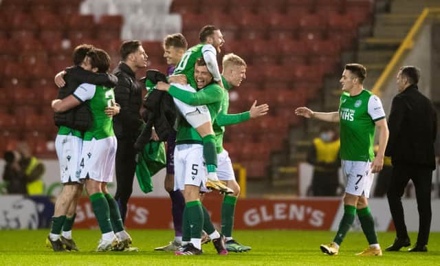 Hibs players celebrate their win over Aberdeen and finishing third.