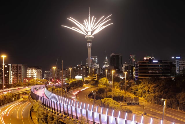 Fireworks are launched from the Sky Tower to mark the changing of the year on New Year's eve in Auckland, New Zealand, Thursday, Dec. 31, 2020. New Zealand and its South Pacific island neighbors have no COVID-19, and New Year celebrations there are the same as ever.
