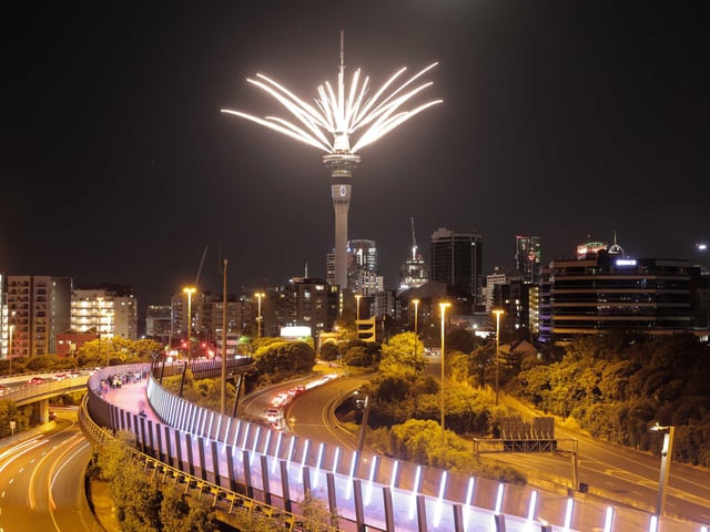 Fireworks are launched from the Sky Tower to mark the changing of the year on New Year's eve in Auckland, New Zealand, Thursday, Dec. 31, 2020. New Zealand and its South Pacific island neighbors have no COVID-19, and New Year celebrations there are the same as ever.