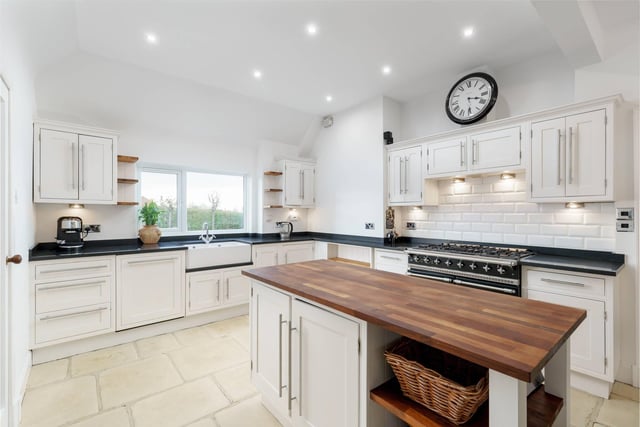 The stylish fully fitted kitchen in this Braids property.