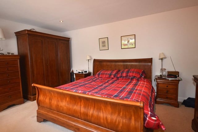 The property has four double bedrooms, with one en suite shower room