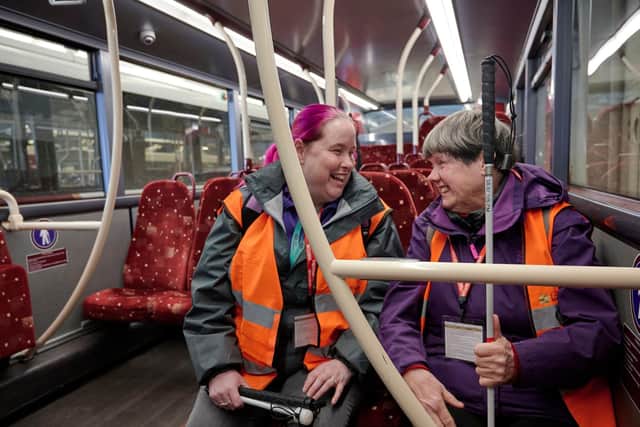 Marie O'Donnell (left) has been working with Margo Scott to help her learn how to get around the city using a cane