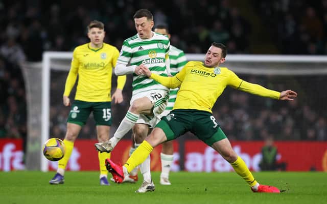 Drey Wright of Hibs battles for the ball with Celtic' Callum McGregor