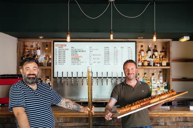 Metre long beers and dogs are a tasty reminder of pub guidelines