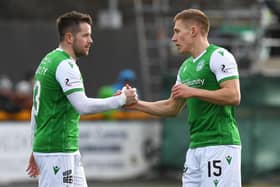Hibs loan players Marc McNulty (left) and Greg Docherty have returned to Reading and Rangers respectively.
