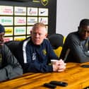 Efe Ambrose (left) and Marvin Bartley either side of Livingston manager Gary Holt. Picture: SNS