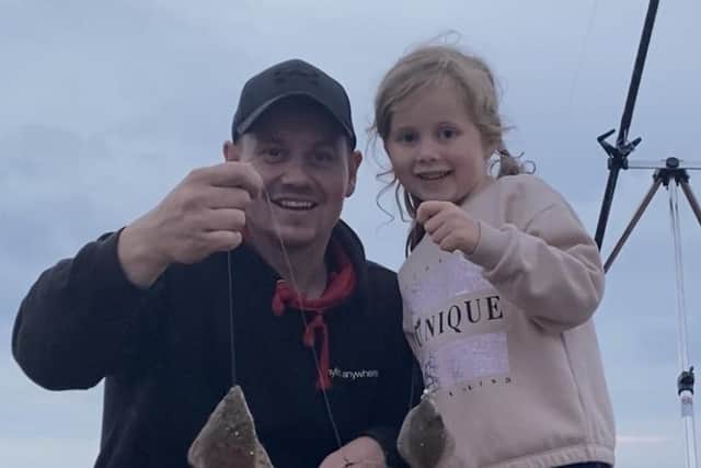 Proud: Dad Chris with budding sea angler Abby