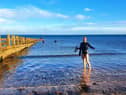 Bracing: Jenny Findlay braves the chilly waters of the North Sea
