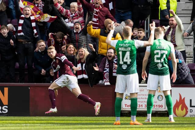 Chris Mueller and Chris Cadden react after Stephen Kingsley put Hearts 2-1 up at Tynecastle. Picture: SNS