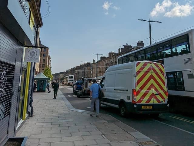 A parked van blocked bus stop and cycle land on Leith Walk