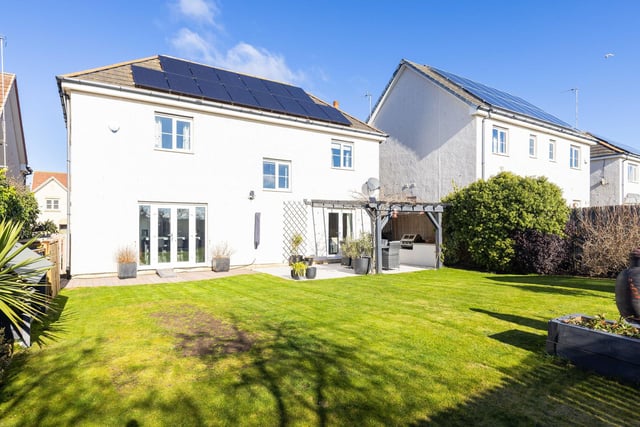 This attractive property in East Lothian comes with solar panels on the roof.