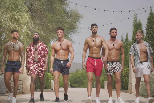 Harry Young (second from right) entering the Love Island villa during Casa Amor
