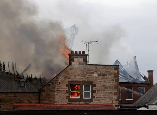 Fire crews tackle the blaze at the Corstorphine Youth and Community Centre in October 2013.